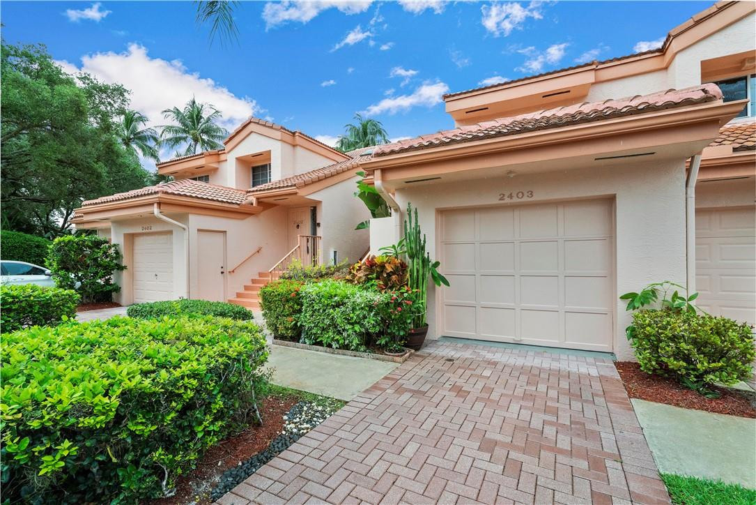 17262 Boca Club Boulevard, Unit 2403 Boca Raton, FL 33487 - Photo 2 of 27 Paver brick driveway to 1 car garage