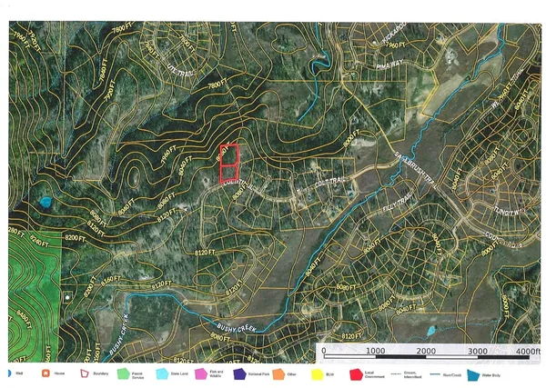 a view of a fence and basketball court