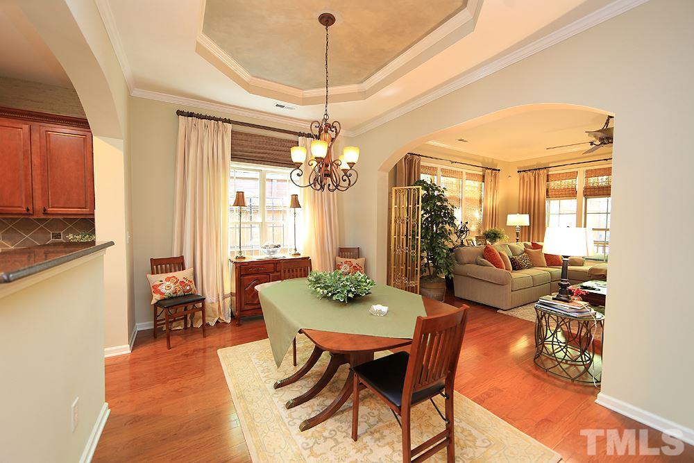 6003 Magenta Court Raleigh, NC 27617 - Photo 12 of 30 a view of a dining room with furniture window and outside view