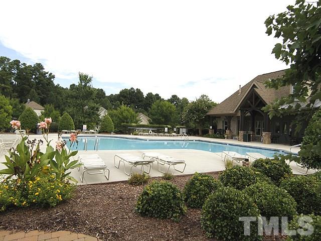 6003 Magenta Court Raleigh, NC 27617 - Photo 29 of 30 a view of yard with swimming pool and outdoor seating