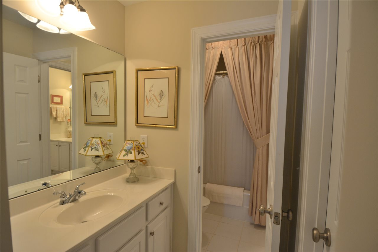 11920 Pawleys Mill Circle Raleigh, NC 27614 - Photo 19 of 21 Features single vanity on one side and a double vanity on the other. WIC Jack and Jill bath