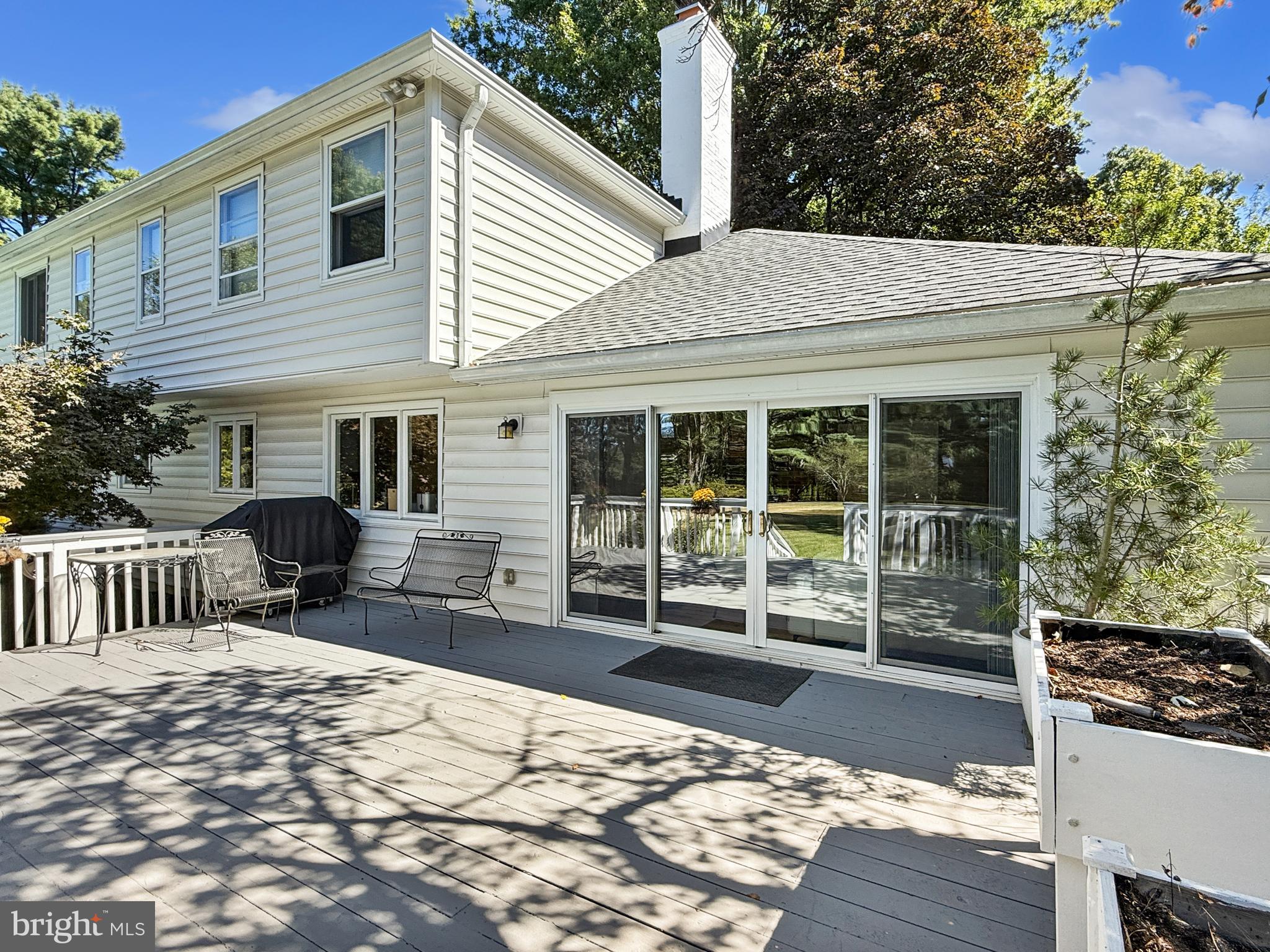21600 Glendalough Road Gaithersburg, MD 20882 - Photo 14 of 64 a front view of a house with a patio