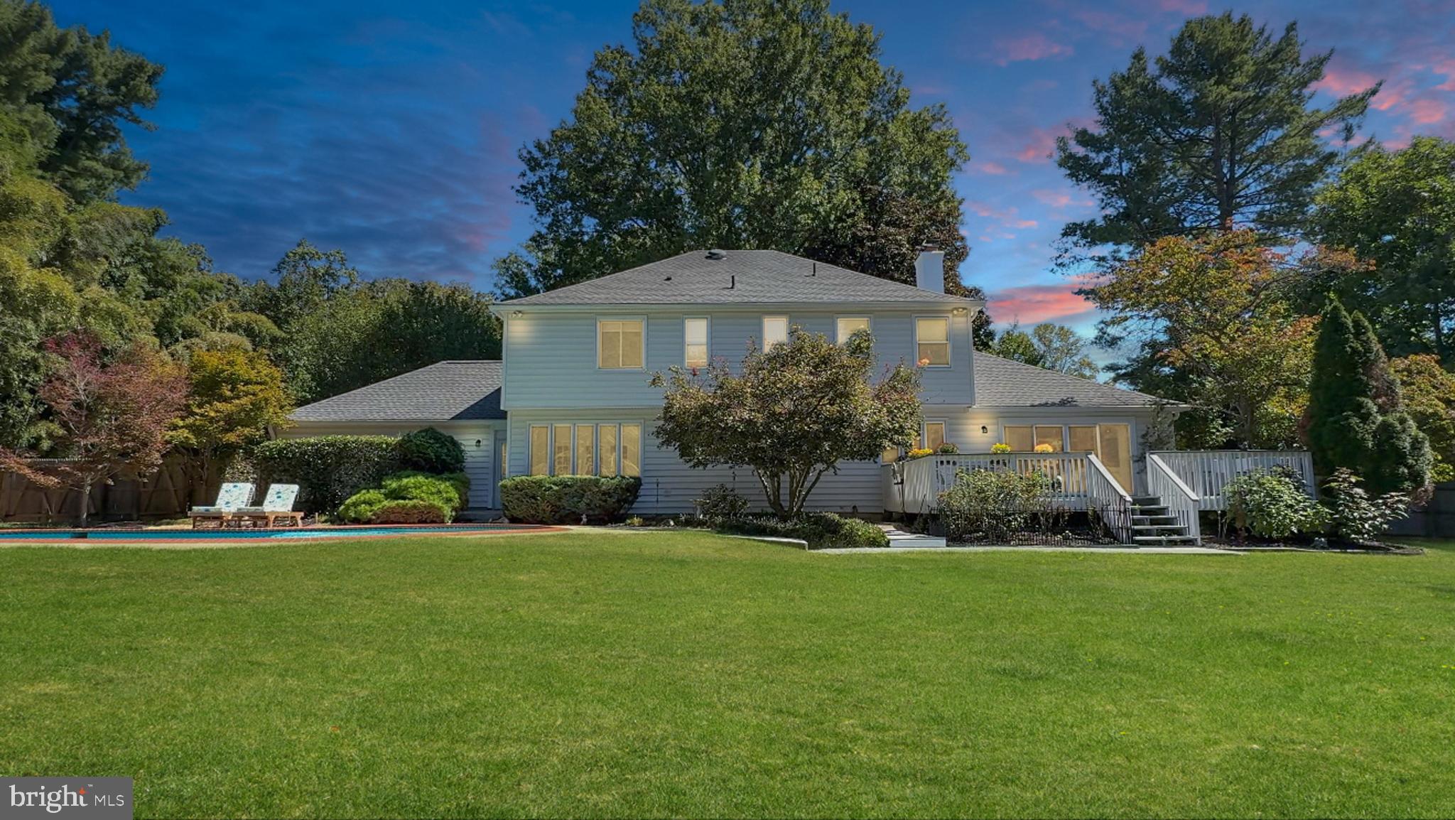 21600 Glendalough Road Gaithersburg, MD 20882 - Photo 3 of 64 a front view of house with yard and green space