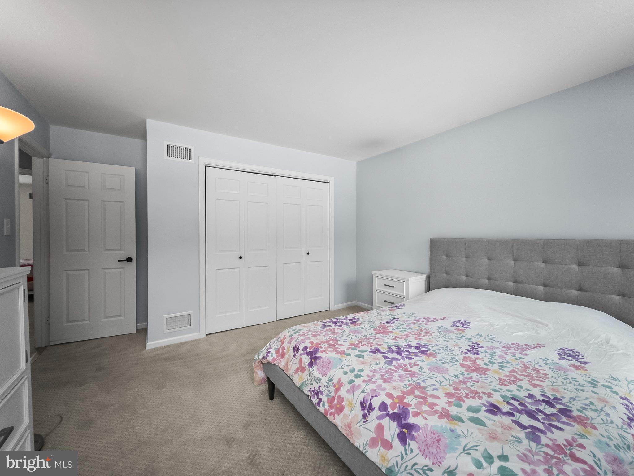 21600 Glendalough Road Gaithersburg, MD 20882 - Photo 39 of 64 a bedroom with a bed and a shower