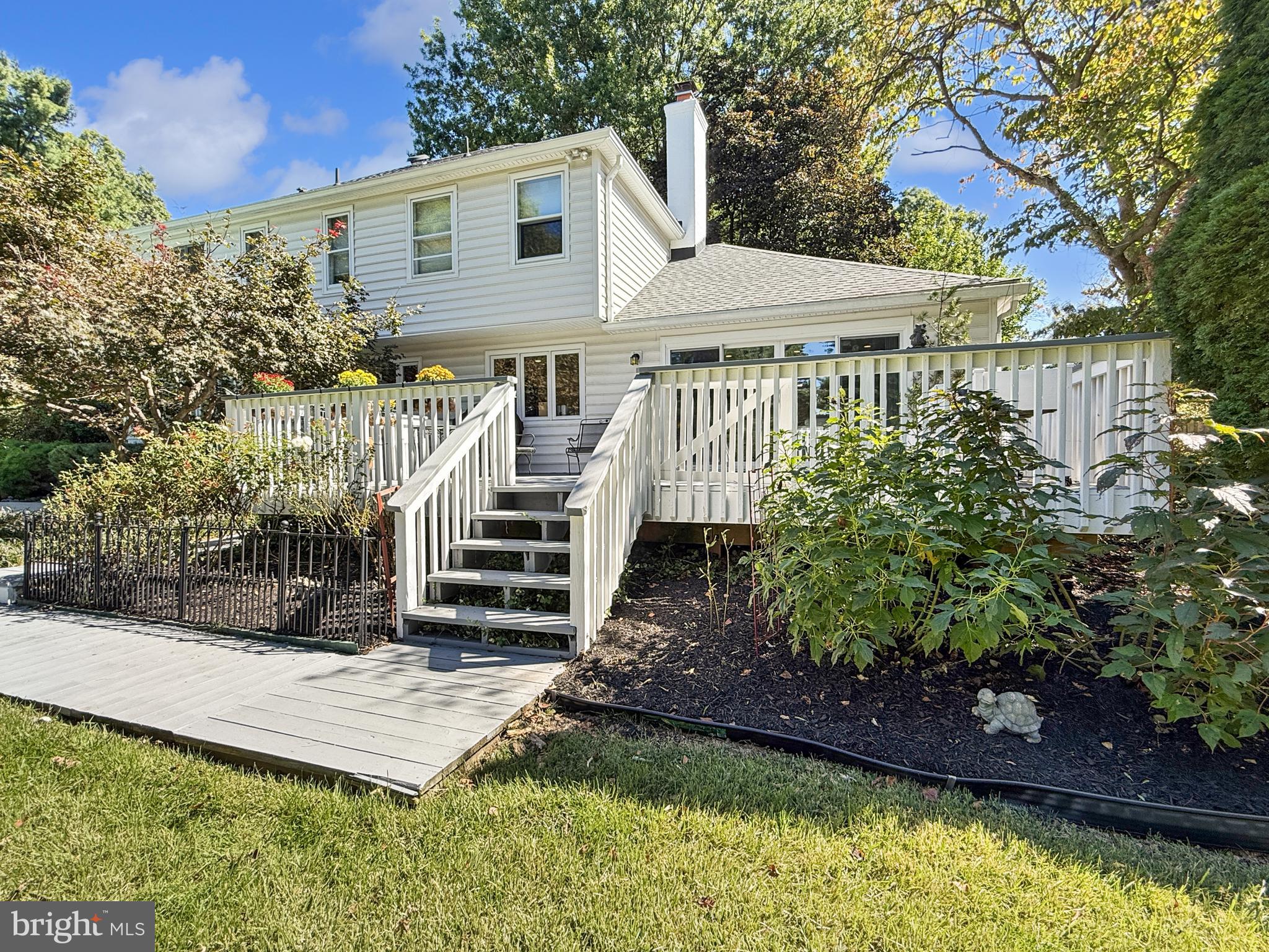 21600 Glendalough Road Gaithersburg, MD 20882 - Photo 5 of 64 a front view of a house with a yard