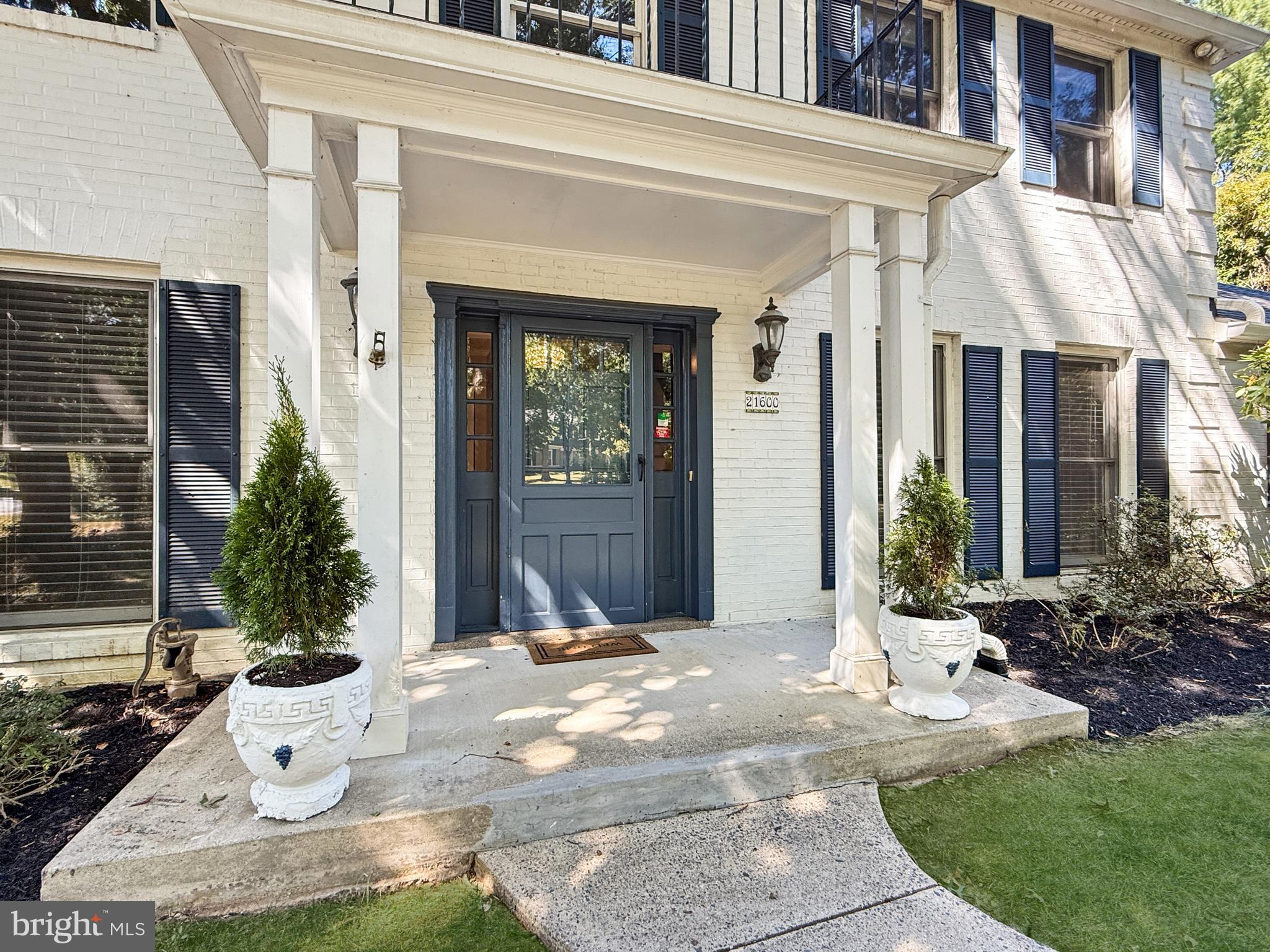 21600 Glendalough Road Gaithersburg, MD 20882 - Photo 54 of 64 a view of a house with outdoor space porch and sitting area