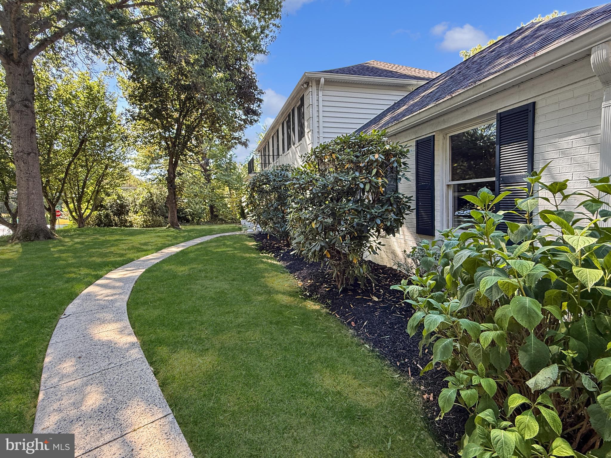 21600 Glendalough Road Gaithersburg, MD 20882 - Photo 6 of 64 a front view of a house with a yard
