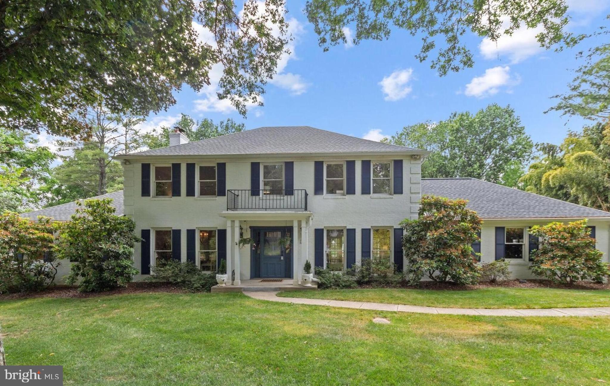 21600 Glendalough Road Gaithersburg, MD 20882 - Photo 64 of 64 a front view of a house with a garden