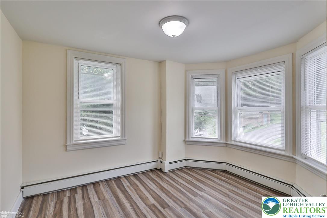 1911 Echo Road Slatington, PA 18080 - Photo 34 of 38 an empty room with wooden floor and windows