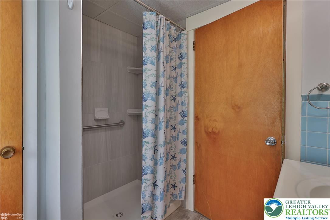 1911 Echo Road Slatington, PA 18080 - Photo 37 of 38 a bathroom with a shower and a toilet