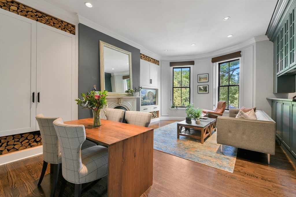 68 Waltham Street, Unit 3 Boston, MA 02118 - Photo 11 of 21 a view of a dining room with furniture window and wooden floor
