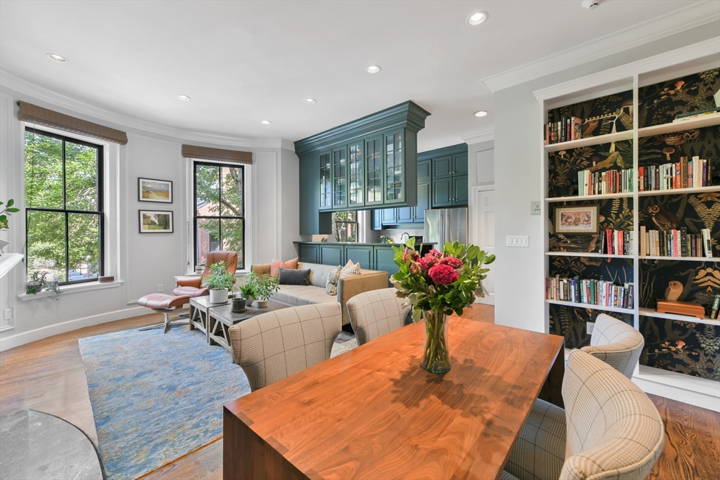68 Waltham Street, Unit 3 Boston, MA 02118 - Photo 9 of 21 a living room with furniture flowers and book shelf