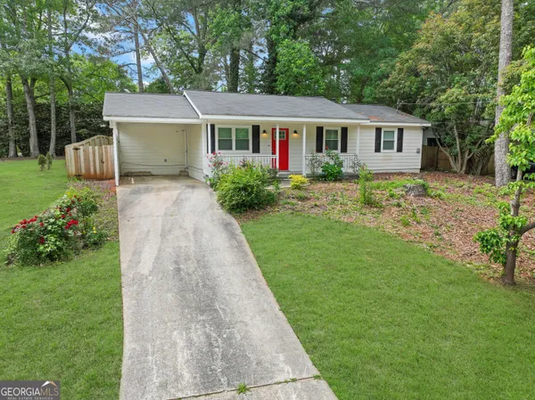 a view of a house with garden