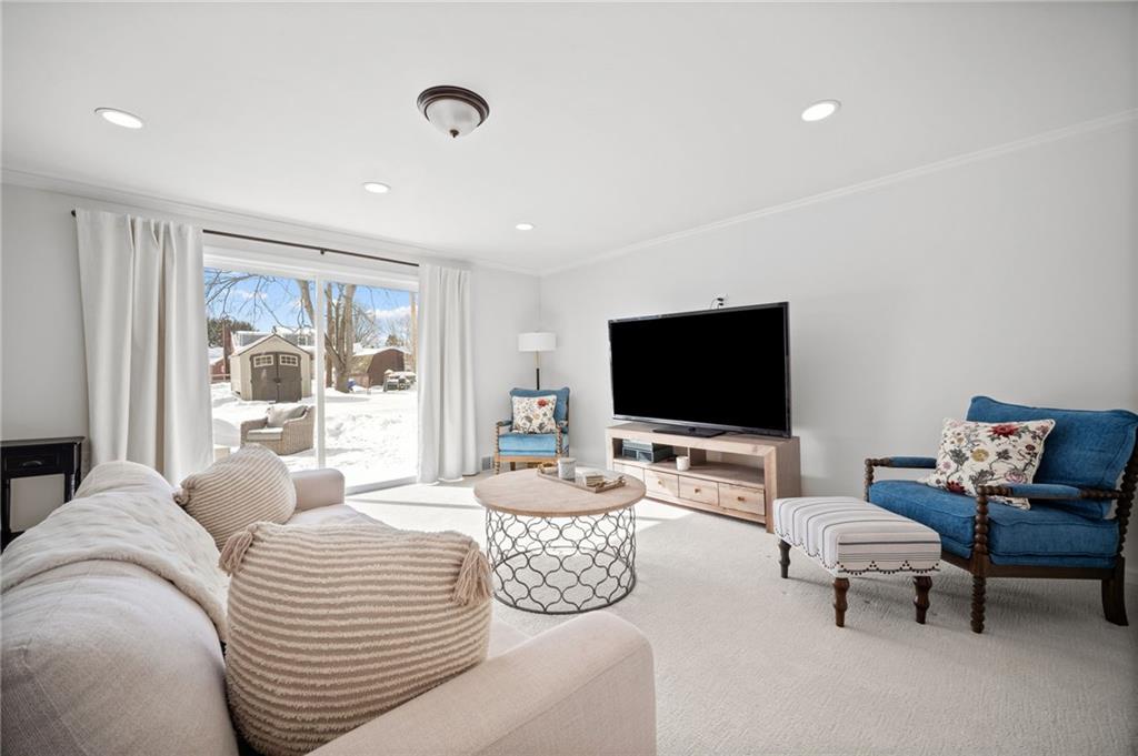 2079 Spring Valley Road Pittsburgh, PA 15243 - Photo 19 of 35 a living room with furniture and a flat screen tv
