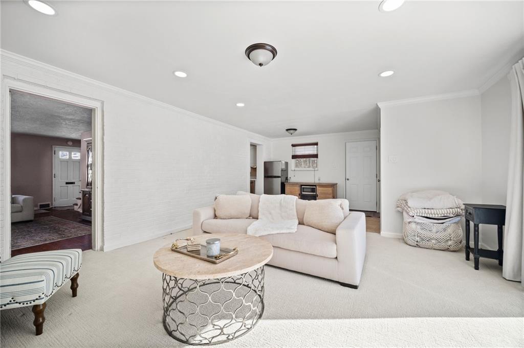 2079 Spring Valley Road Pittsburgh, PA 15243 - Photo 22 of 35 a living room with furniture and a table