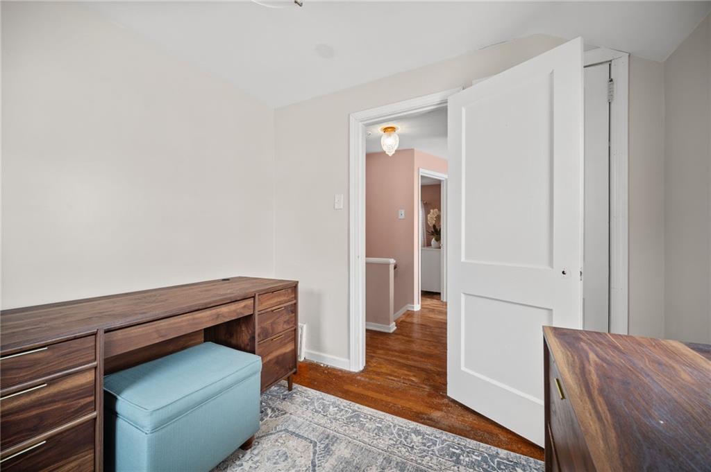 2079 Spring Valley Road Pittsburgh, PA 15243 - Photo 27 of 35 a view of bedroom with furniture and wooden floor