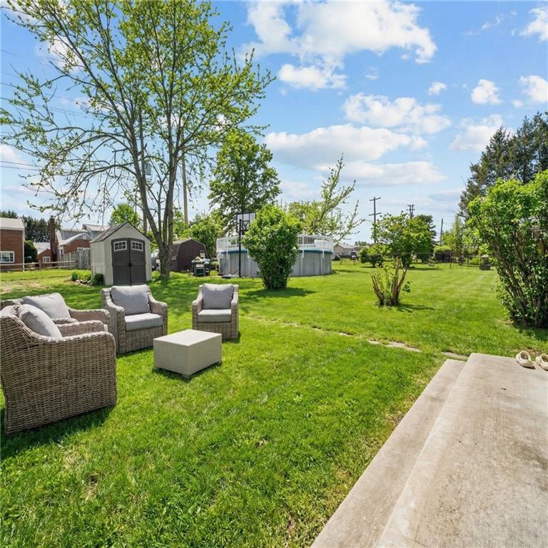 2079 Spring Valley Road Pittsburgh, PA 15243 - Photo 31 of 35 a view of a garden with couches and large trees