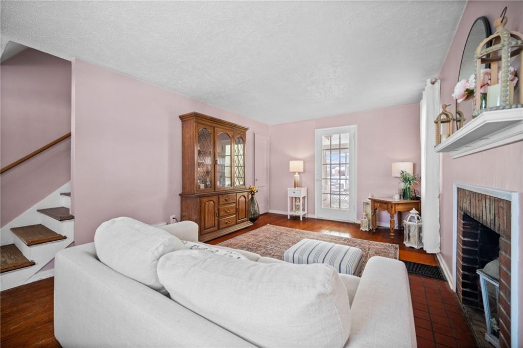 2079 Spring Valley Road Pittsburgh, PA 15243 - Photo 6 of 35 a living room with furniture fireplace and window