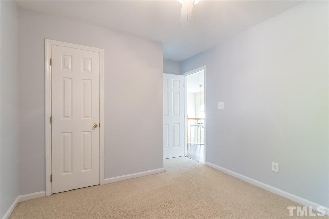 8612 Swarthmore Drive Raleigh, NC 27615 - Photo 23 of 30 a view of an empty room and window