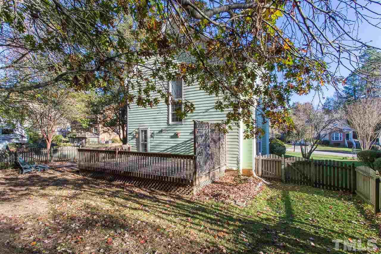 8612 Swarthmore Drive Raleigh, NC 27615 - Photo 5 of 30 a front view of a house with a yard