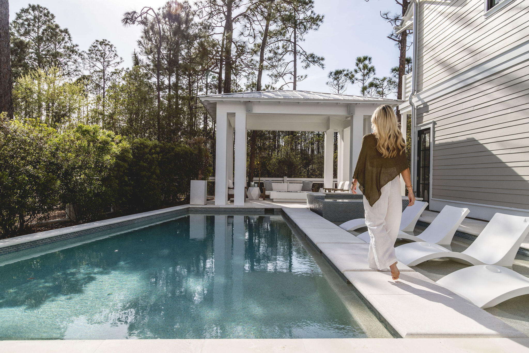 a view of a swimming pool with a patio