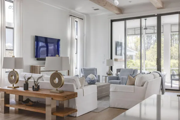 a living room with furniture and a window