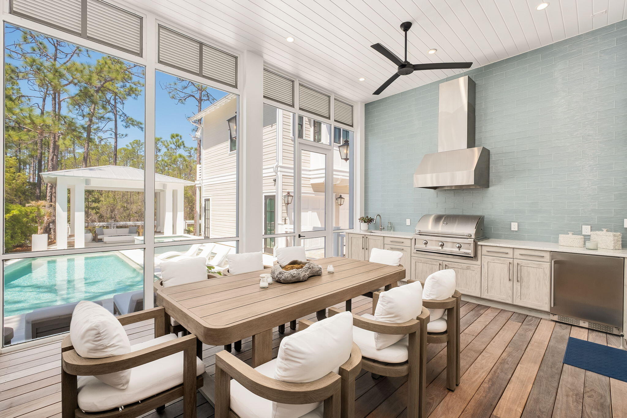 565 East Royal Fern Way Santa Rosa Beach, FL 32459 - Photo 13 of 24 a dining room with furniture and wooden floor