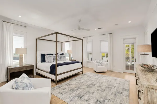 a bedroom with furniture and white walls