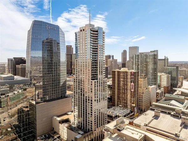 a view of a city with tall buildings