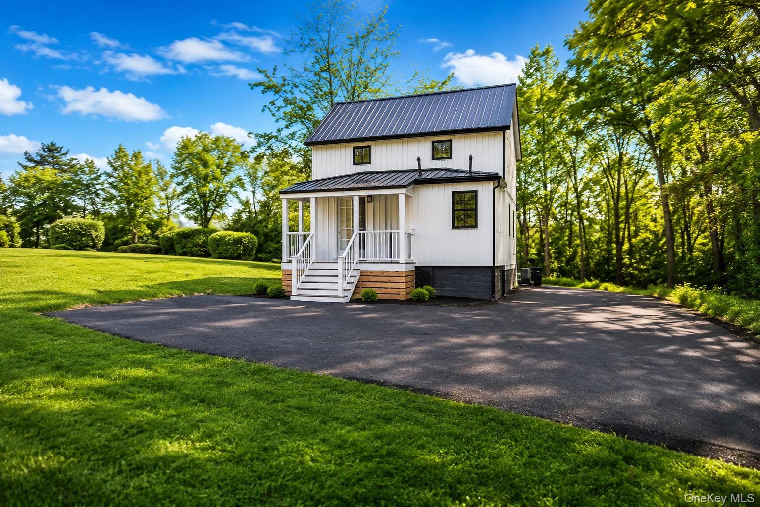 386 Lakeside Road Newburgh, NY 12550 - Photo 4 of 31 a house view with backyard space