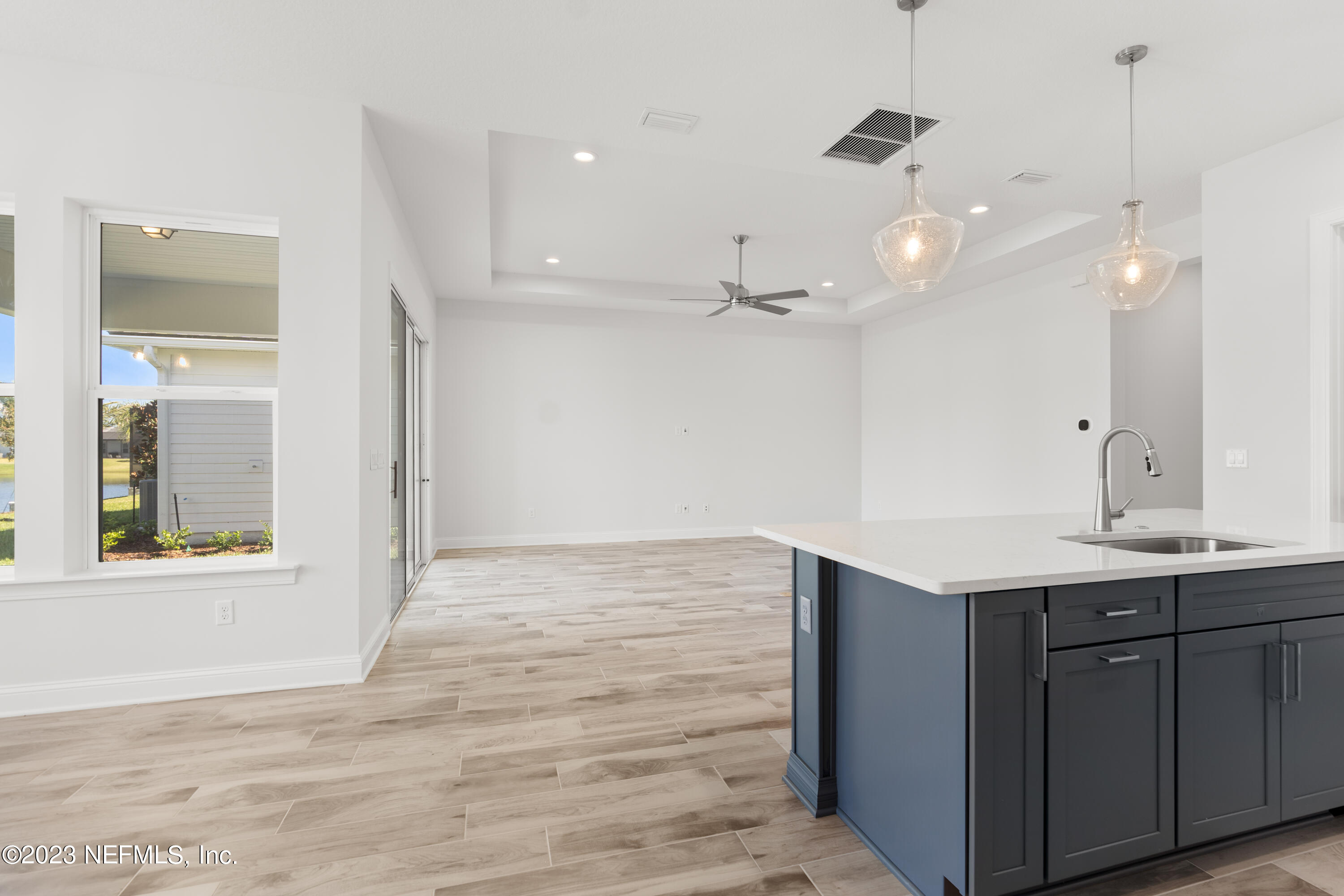 110 Amarante Lane St. Augustine, FL 32095 - Photo 11 of 39 Kitchen to Family Room