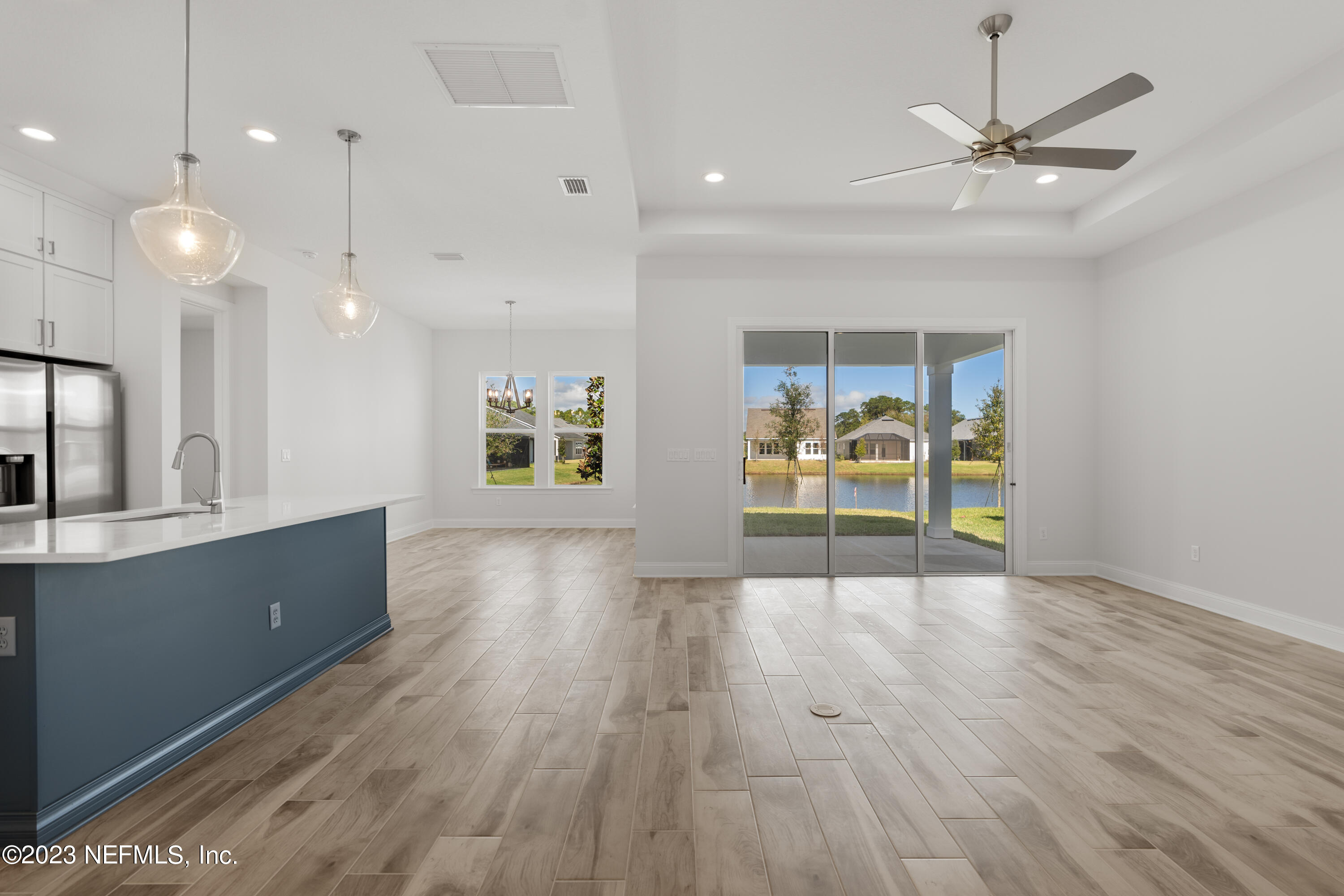 110 Amarante Lane St. Augustine, FL 32095 - Photo 14 of 39 Family Room and Kitchen