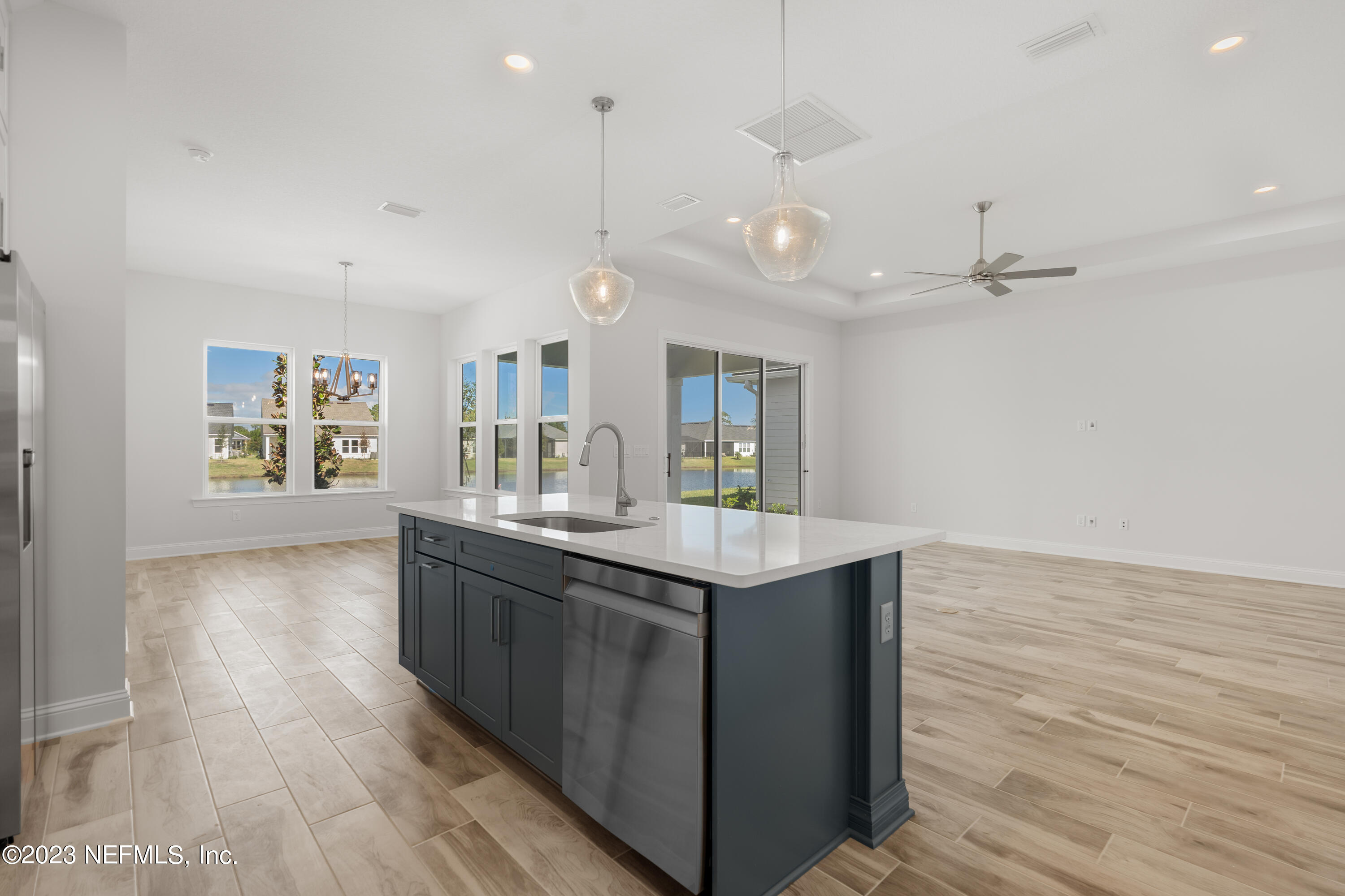 110 Amarante Lane St. Augustine, FL 32095 - Photo 10 of 39 Kitchen to Family and Dining