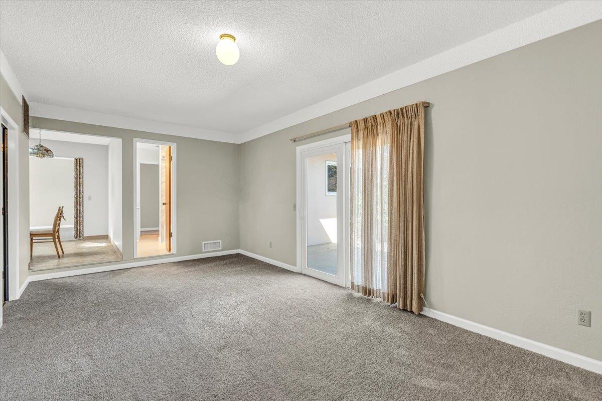 3111 Carmelo Circle Marina, CA 93933 - Photo 16 of 35 an empty room with windows and closet