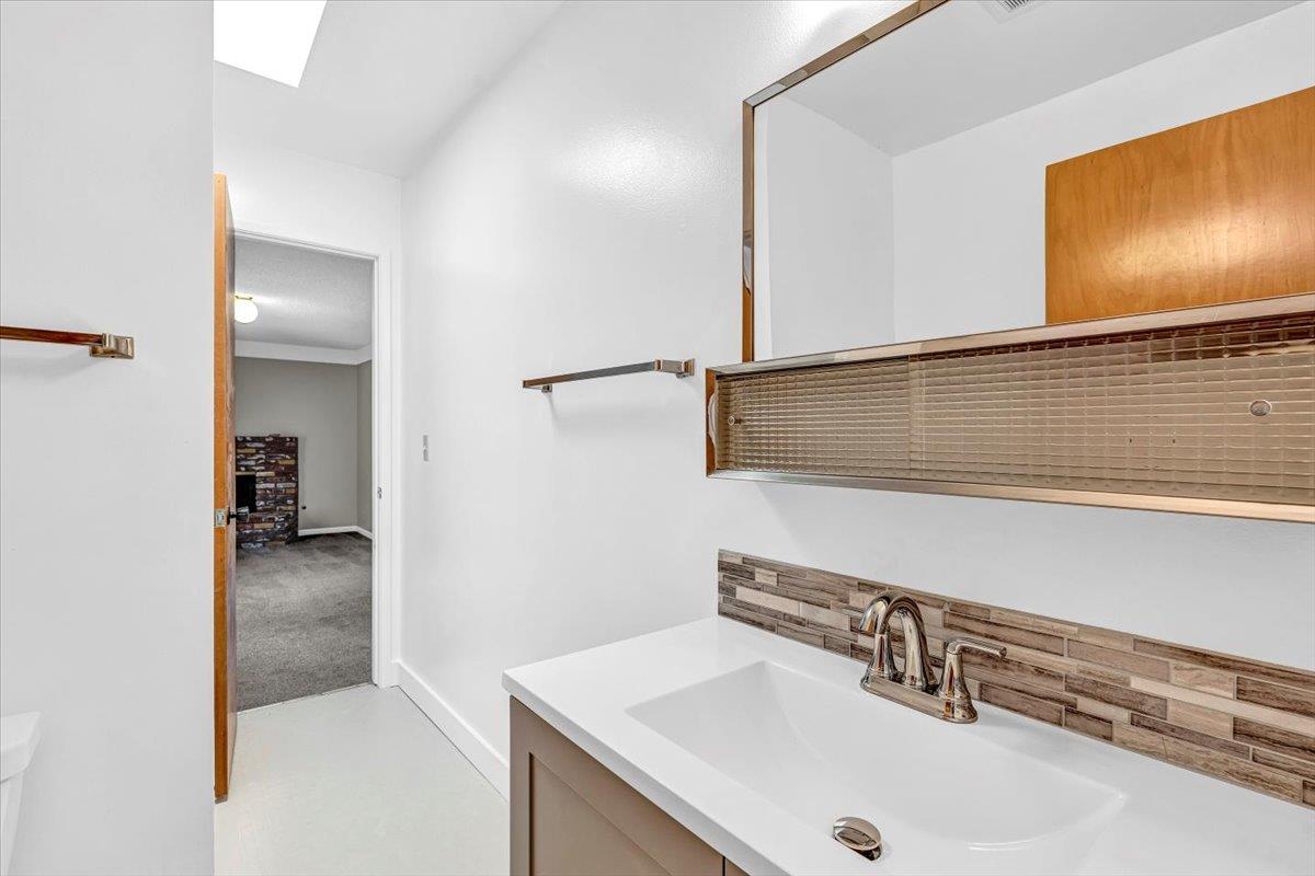 3111 Carmelo Circle Marina, CA 93933 - Photo 18 of 35 a bathroom with a sink and a mirror