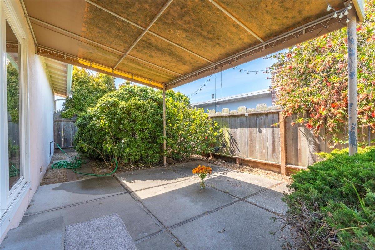 3111 Carmelo Circle Marina, CA 93933 - Photo 31 of 35 a view of backyard with small cabin and wooden fence