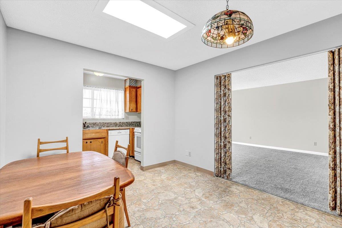 3111 Carmelo Circle Marina, CA 93933 - Photo 10 of 35 an empty room with a table and chairs