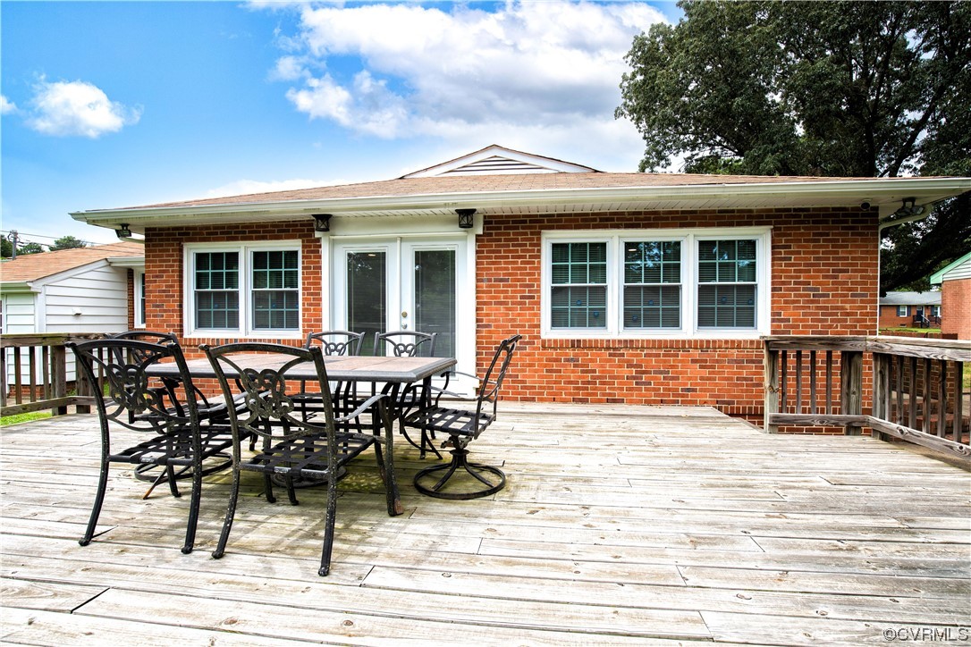 5505 Raleigh Road Henrico, VA 23231 - Photo 24 of 30 a view of a house with wooden bench and floor