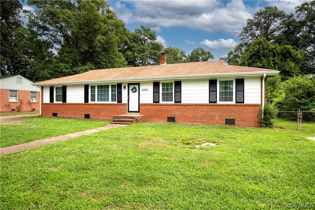 5505 Raleigh Road Henrico, VA 23231 - Photo 28 of 30 a front view of a house with a yard