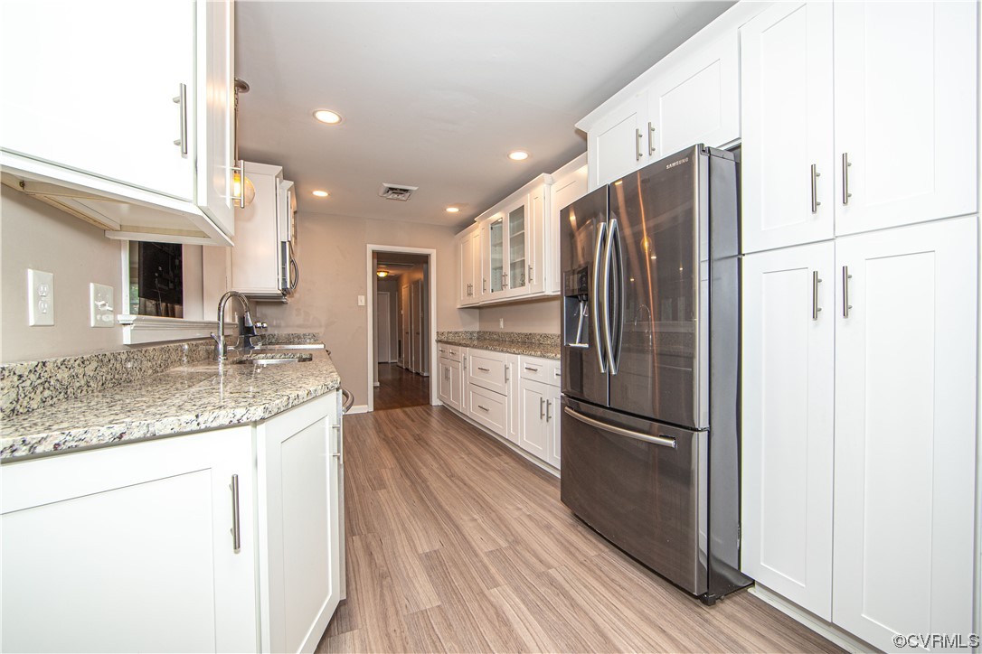 5505 Raleigh Road Henrico, VA 23231 - Photo 5 of 30 a kitchen with stainless steel appliances granite countertop a refrigerator and a sink