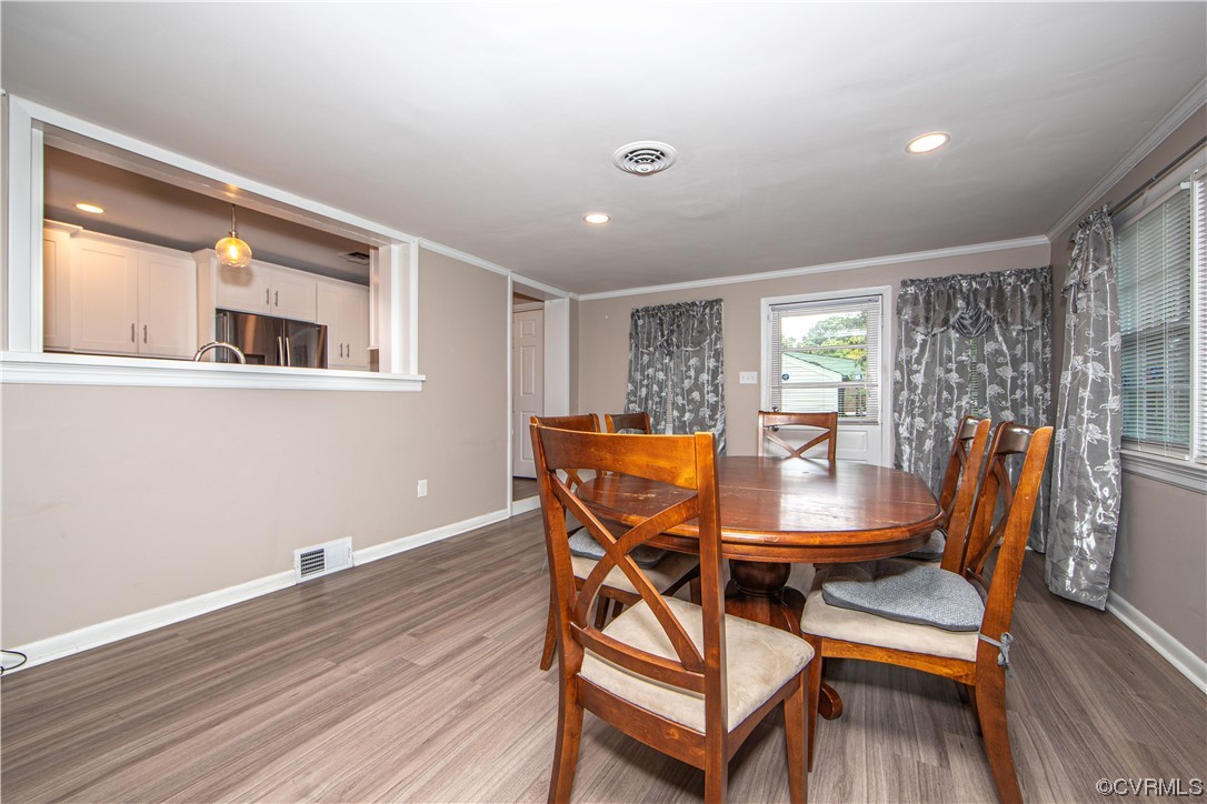 5505 Raleigh Road Henrico, VA 23231 - Photo 9 of 30 a dining room with furniture and wooden floor