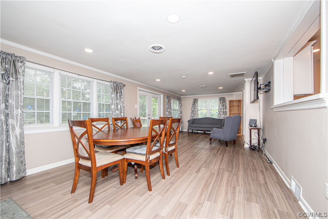 5505 Raleigh Road Henrico, VA 23231 - Photo 10 of 30 a dining room with furniture and wooden floor