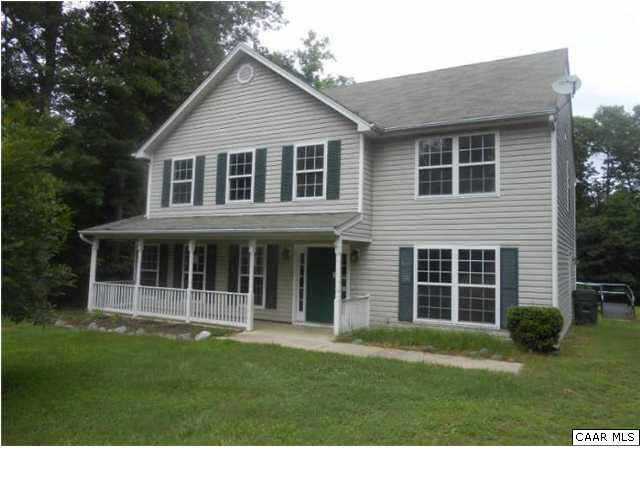 157 Meadow Ridge Road Troy, VA 22974 - Photo 1 of 11 a view of a house with a yard and large trees