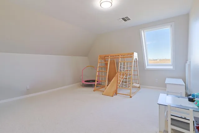 a view of a livingroom with furniture
