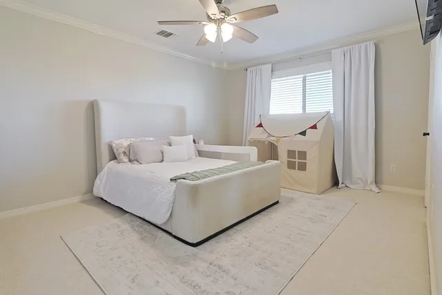 a room with a bed and window