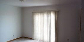 10730 West Edgewood Road Polo, IL 61064 - Photo 4 of 5 an empty room with windows