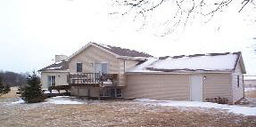 10730 West Edgewood Road Polo, IL 61064 - Photo 5 of 5 a view of a house with a yard and large tree