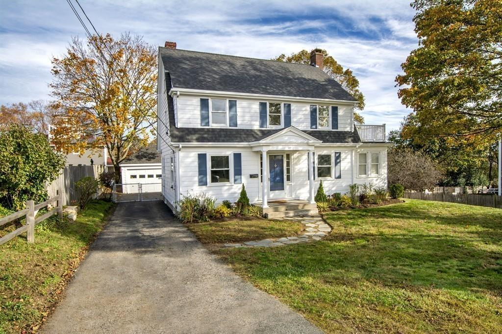 20 Bay Ridge Road Scituate, MA 02066 - Photo 3 of 41 a front view of a house with a garden