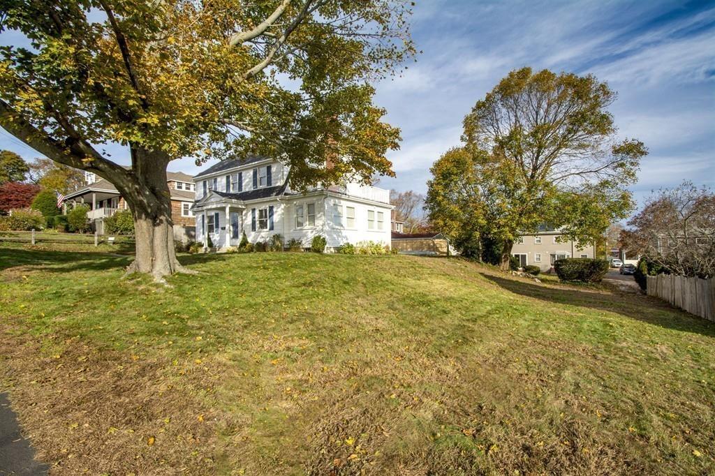 20 Bay Ridge Road Scituate, MA 02066 - Photo 5 of 41 a view of a yard with plants and large trees