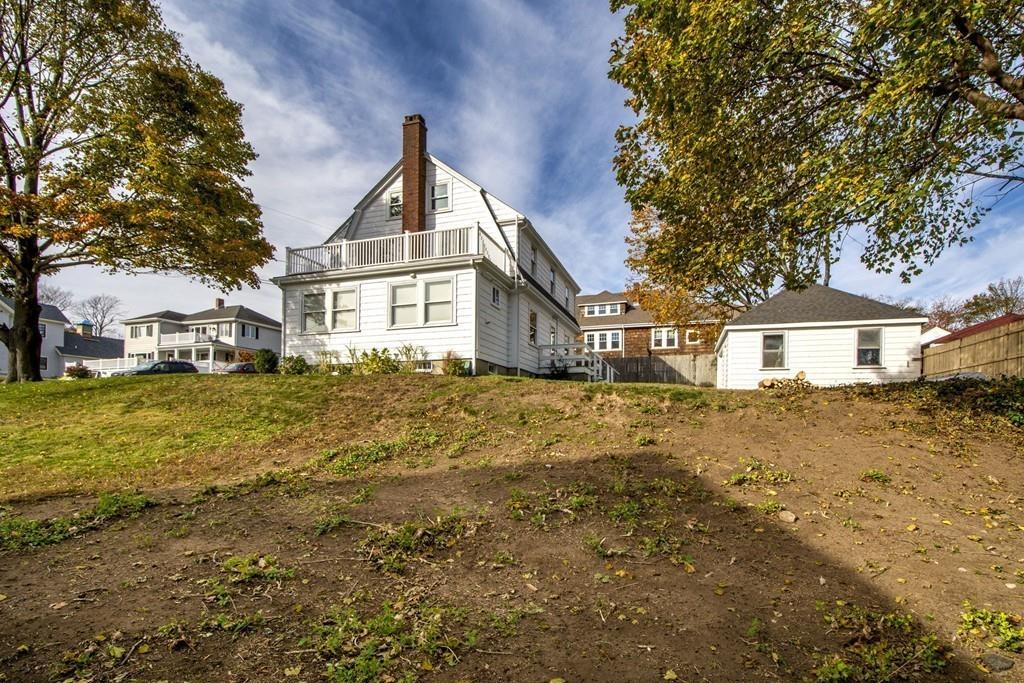 20 Bay Ridge Road Scituate, MA 02066 - Photo 8 of 41 a front view of a house with a garden